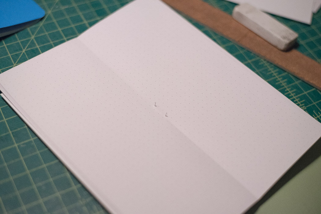 process photo showing the staple on the inside of the notebook