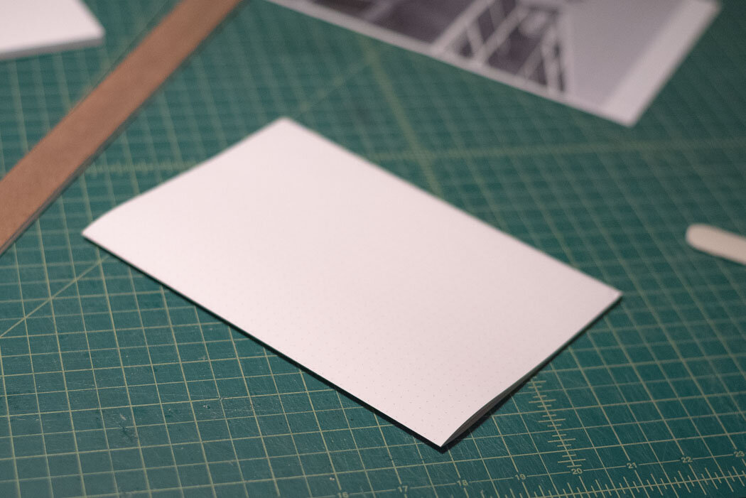 process photo showing the folded paper