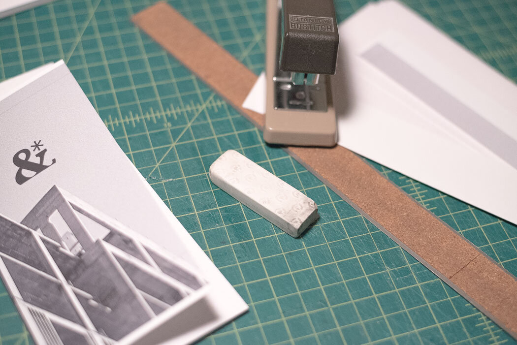 process photo showing the stapler and eraser block